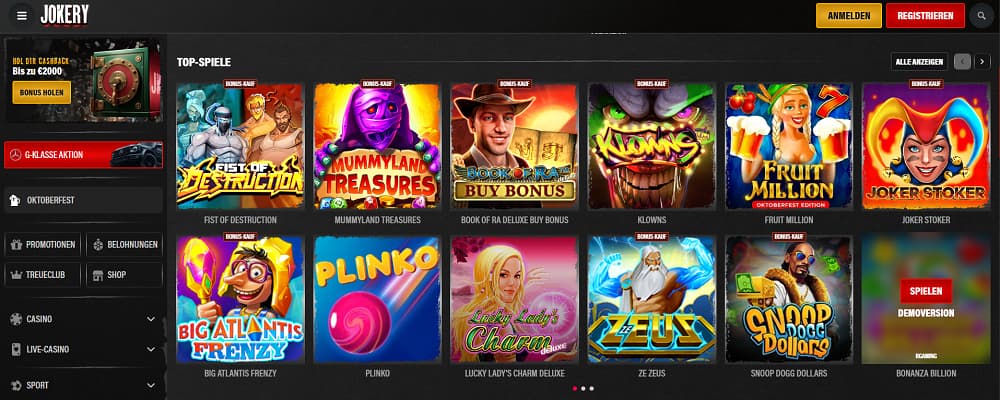 Jokery Casino-Startseite mit einem bunten Raster beliebter Spiele wie Fist of Destruction, Mummyland Treasures und Zeus 1000 sowie einem Banner mit bis zu 1000 € Bonus und 150 Freispielen. Die Oberfläche bietet Navigation für Jackpots, Megaways, Feature Buys und klassische Slots.
